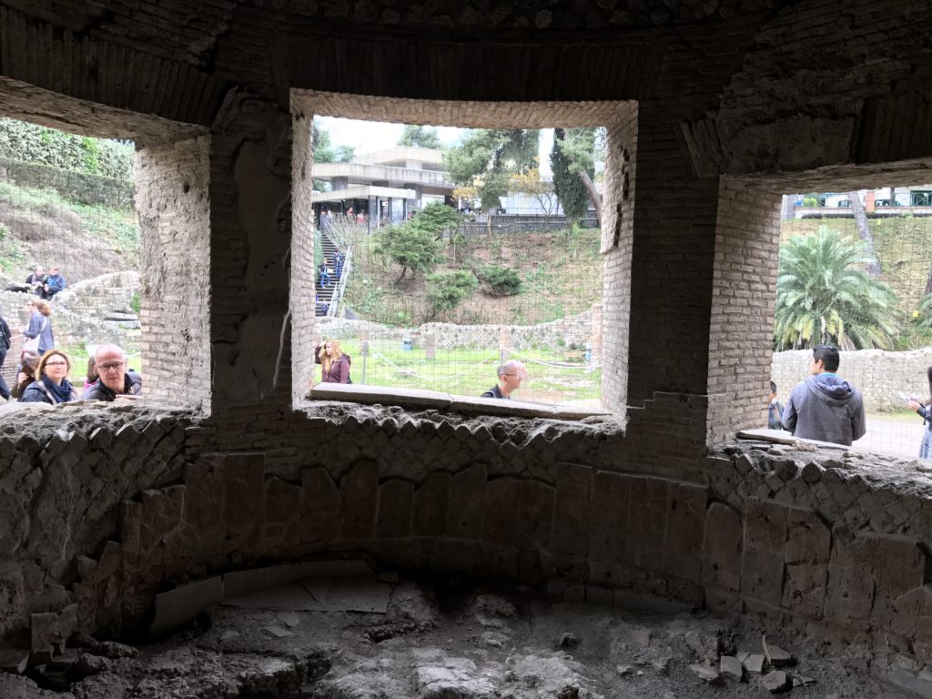 View from inside Pompeii's Roman bath overlooking the river. The gap between the layers of the wall provide insulation and the gap under the floor provides space for heating