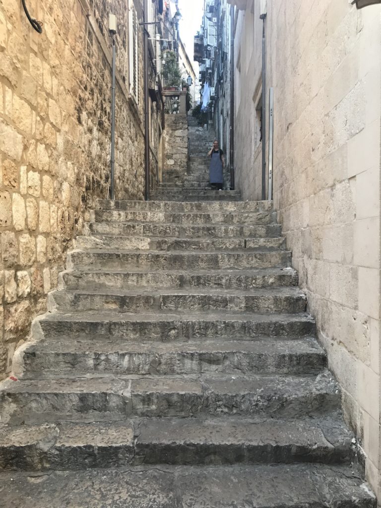 The streets north and perpendicular to Stradun are steep but the streets parallel to Stradun are flat and filled with cafes and shops. 