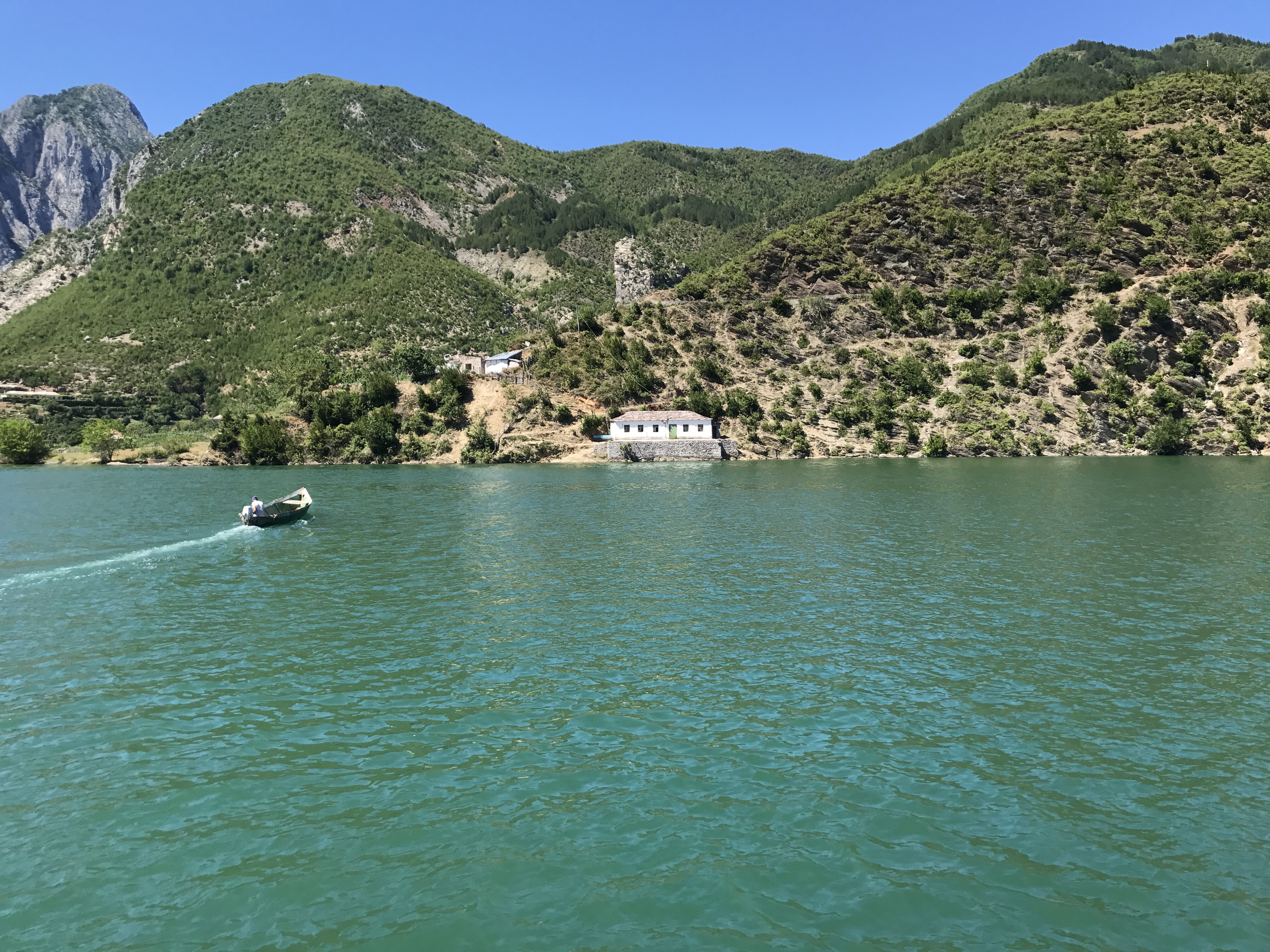 A lady from this house wanted to go to Shkoder, so got a ride on this boat to get to our ferry. From there she drove with us to Shkoder. During winter when everything is covered in snow and there is no ferry, these homes are completely isolated for months at a time. 