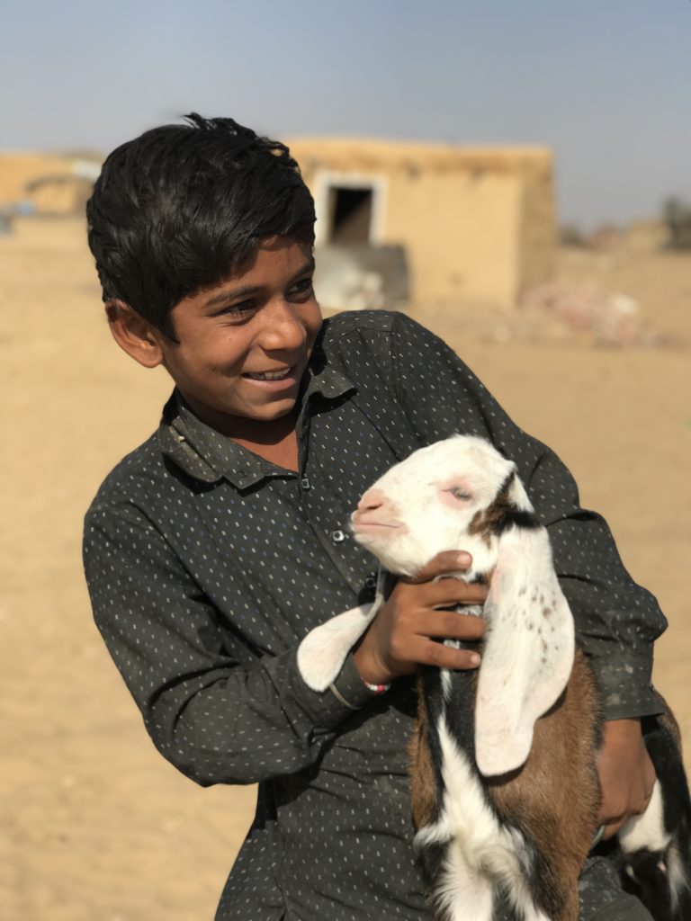 One of the wonderful children of Gumnewala shows off the newest cute baby kid. 