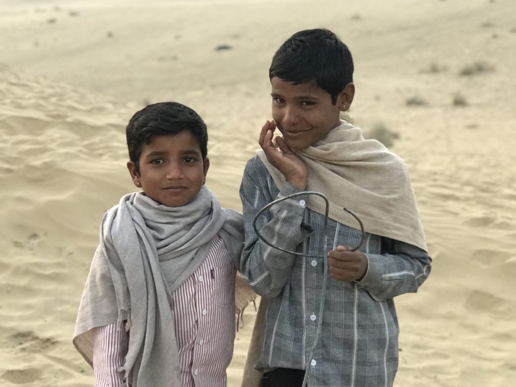 Our cute friends, Narendra Singh and Bhupendir Singh, on their way to gather feed for the goats. 