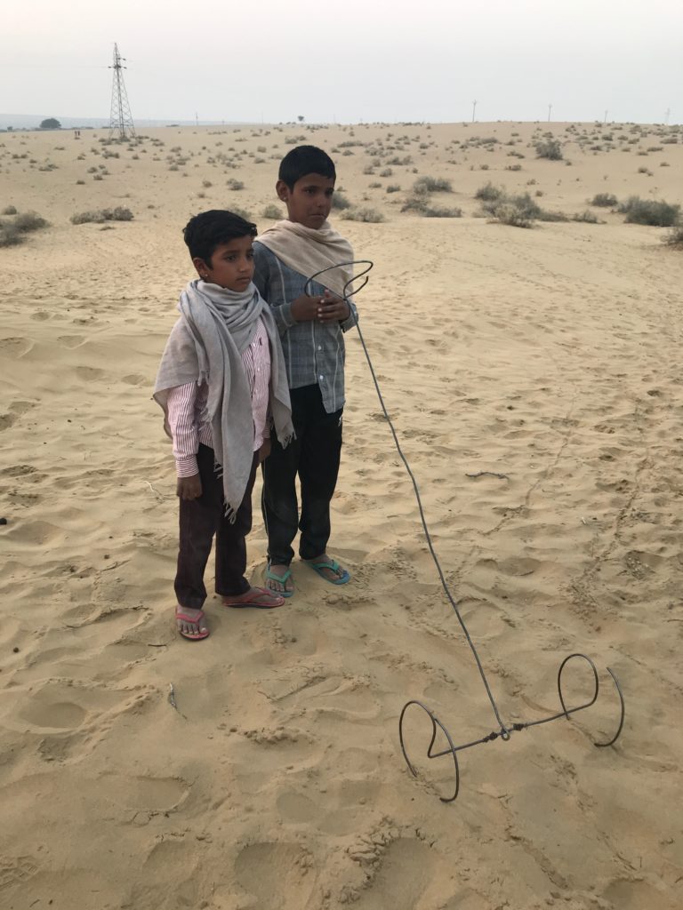 The confidence little guy is quite the engineer. He made the toy his friend wheeled all the way from the village. He has another eight of them at home where he’s experimenting different designs. 