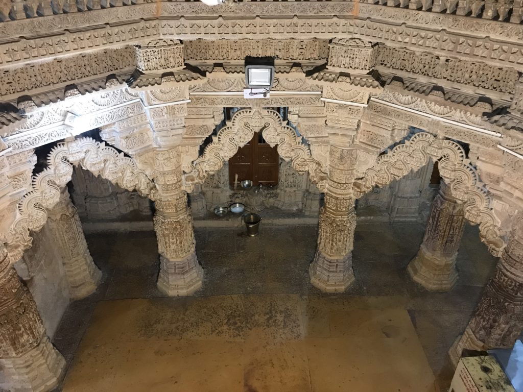 Looking down from the second floor, its easier to see part of the circle of arches in the center of a Jain temple in Jaisalmer Fort.