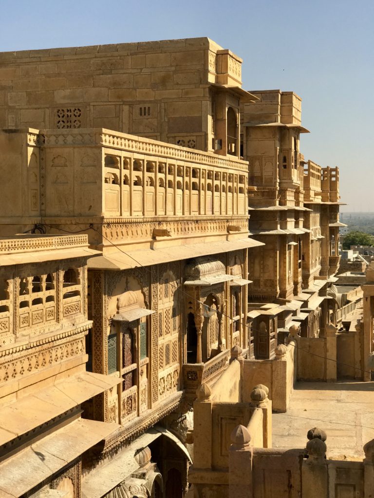 The rooftop provides a nice view of the Haveli, the neighborhood, the busy street below and the entire city. 