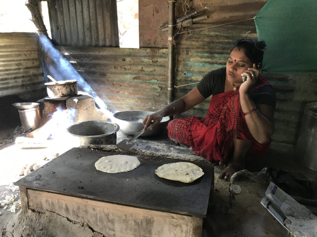 Another lady making fresh bhakri for her clients.