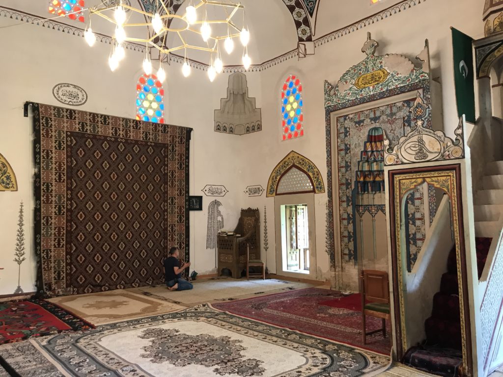 A man worships in this mosque in the Koski Mehmed Pasha Mosque in Mostar.