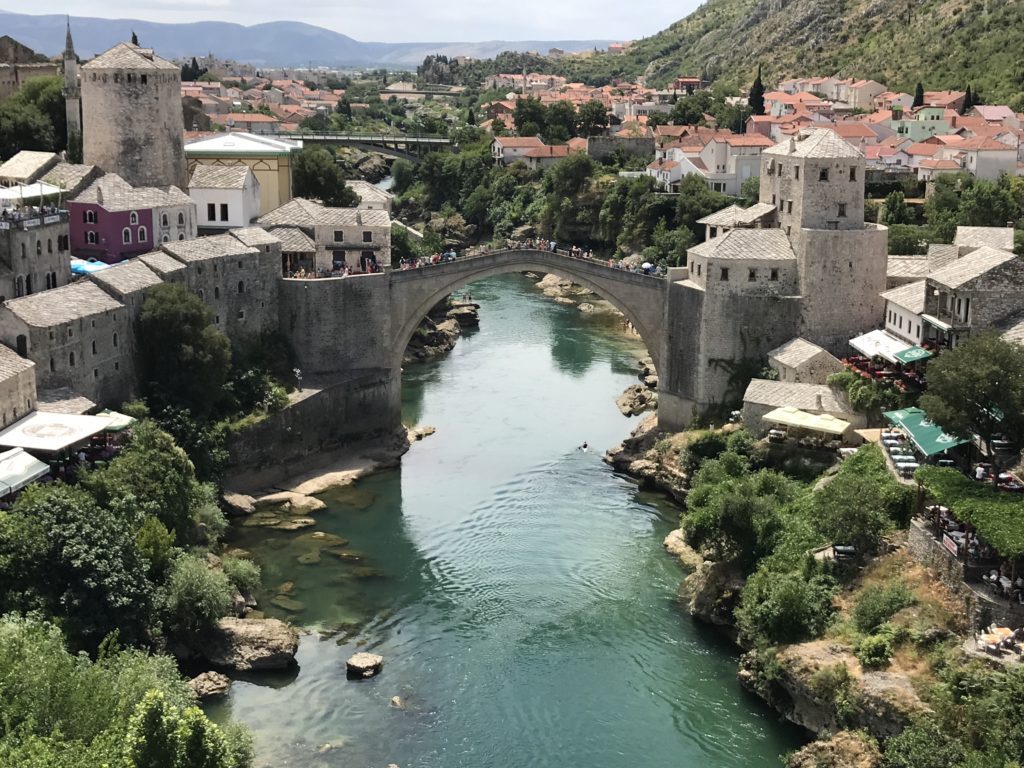 Looking down from the mosque to the Old Bridge of Mostar, you can see how it brings together the two people - Christians (Serbs and Croats) and Muslims. The Stari Most was destroyed in 1993 during the war and finally rebuilt in 2004.