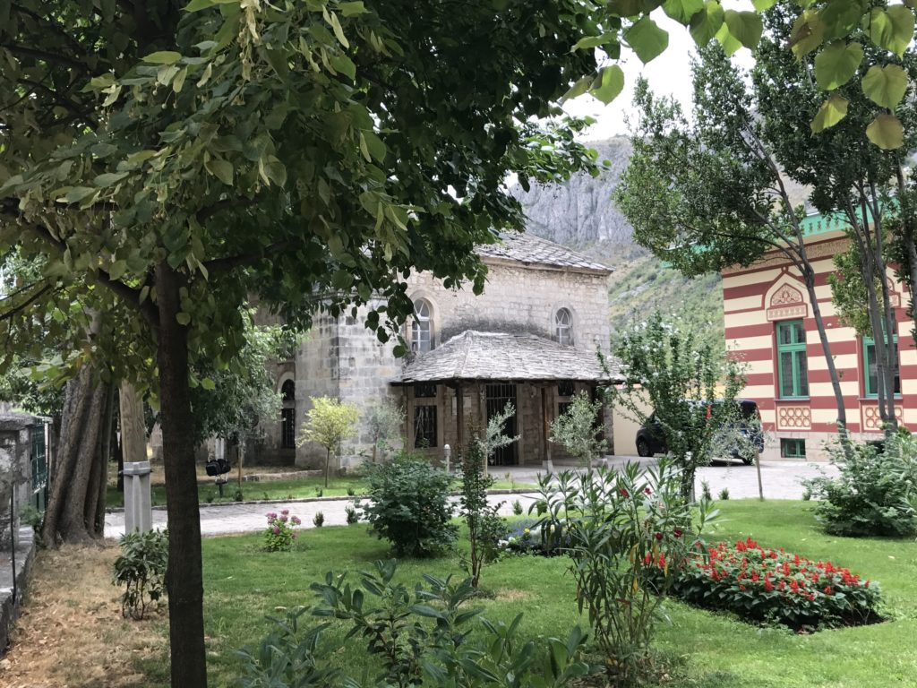 Mostar's old buildings with gunshots stands next to young and good looking restored or new structures.