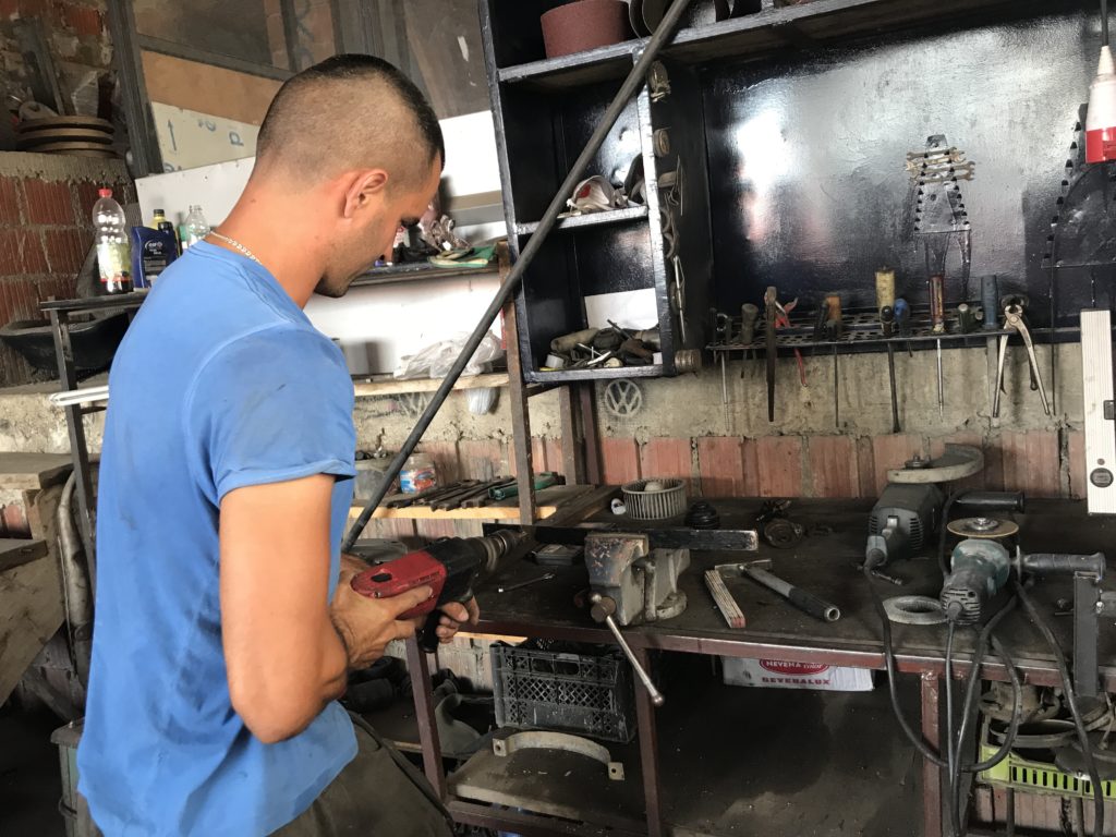 The mechanic drilled holes in a sturdy metal plate to fasten the screws holding the plastic cover under the car. It took 5 euro, unlike the hundreds we would spend in US. 