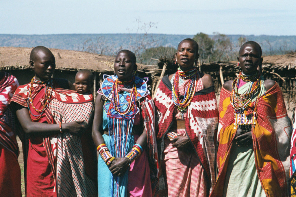 Some Maasai women sing a welcome song when we arrived their hamlet in Masai Mara.