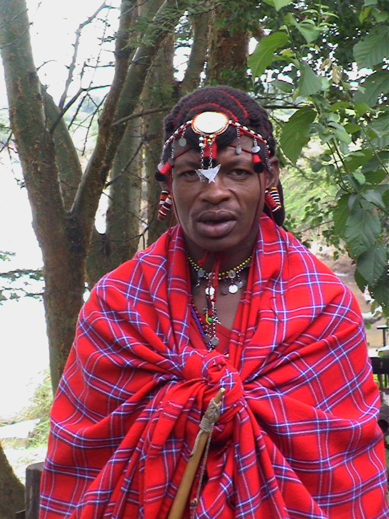 A Maasai male in traditional outfit.