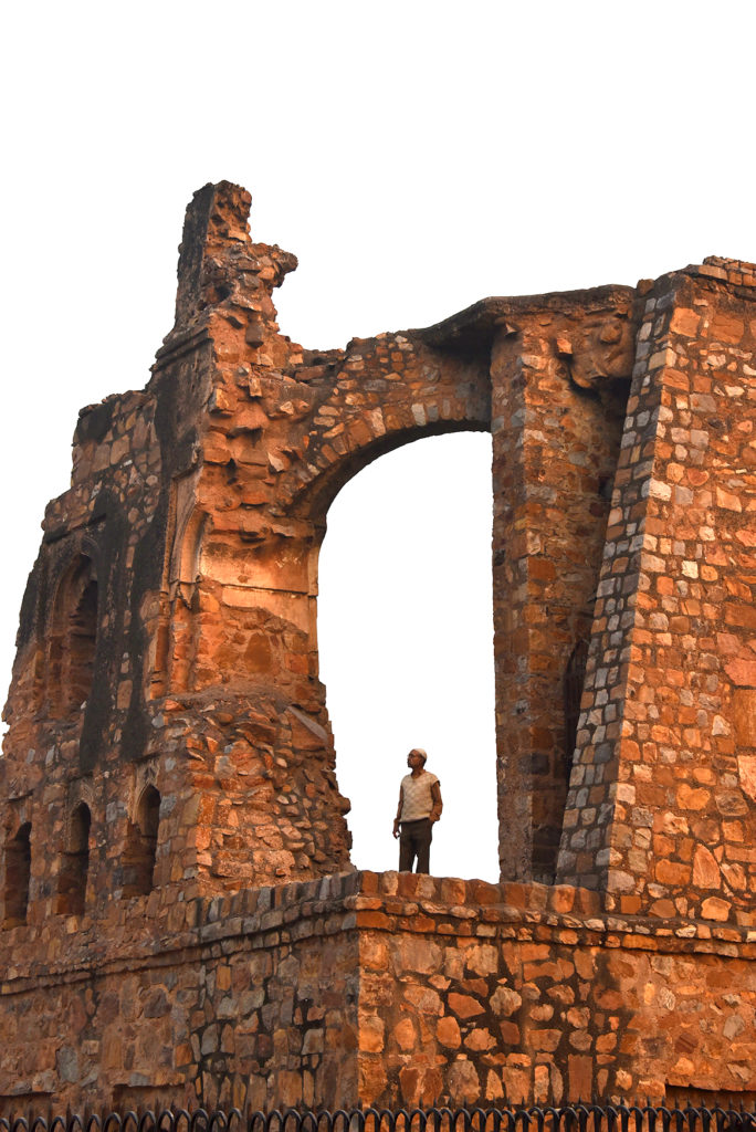 Local man beholding the grandeur of once majestic mosque in Feroz Shah Kotla, Delhi