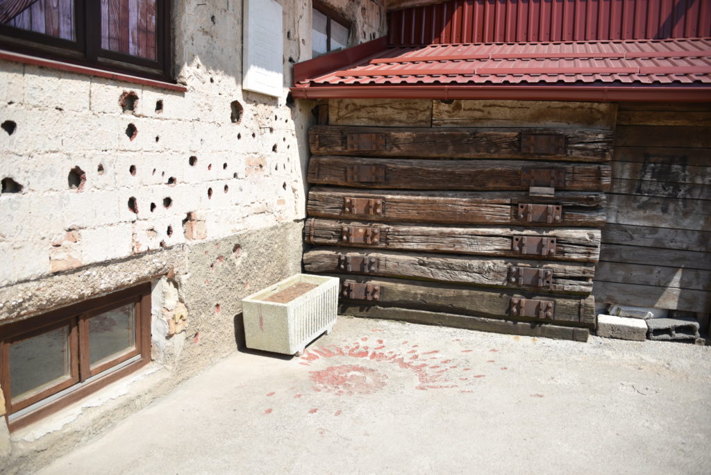 The continuous attack the house near the tunnel entrances made it treacherous for the workers. The red marks on the ground is where some people standing in line were shot.