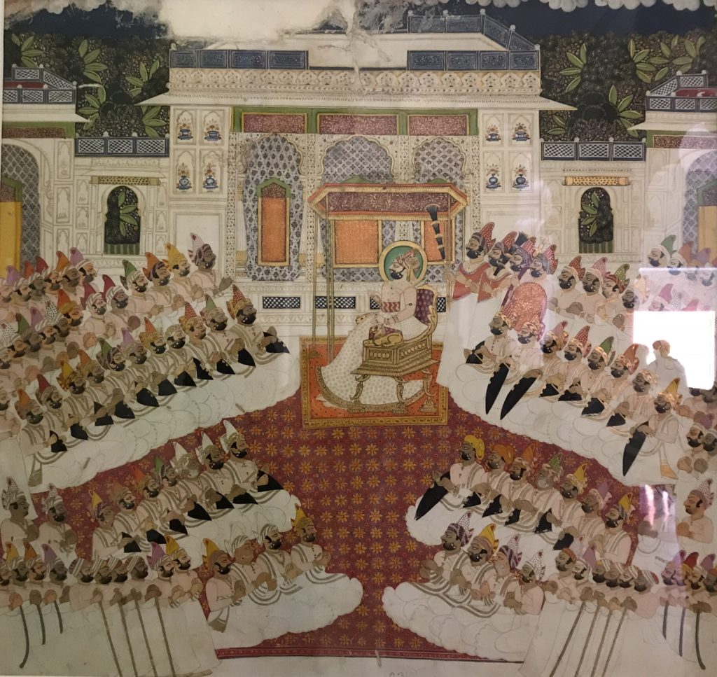 The grand King’s court of Jodhpur reflects diversity in its people, with the many turban styles and skin color. 