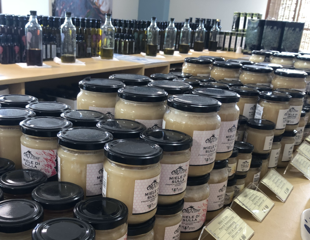 Honey, sun-dried tomatoes, capers, olives and spreads at a shop in Sicily