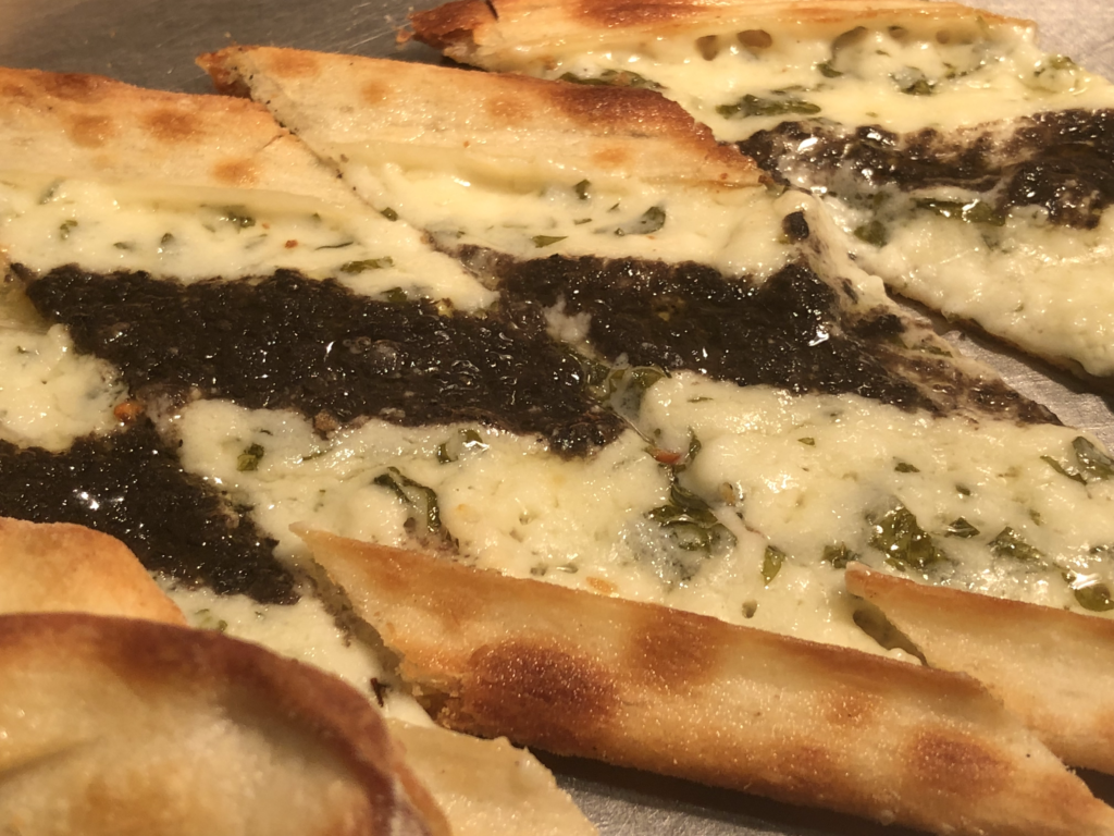 Our favorite is the pide that made live every half an hour. The cheese and parsley pide topped with basil sauce is my family’s favorite. 