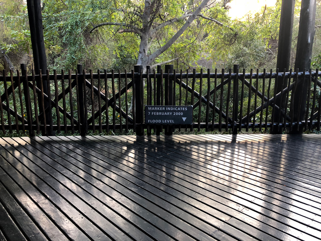 The rooms on the second floor and the numerous walkways make sense after seeing this sign in Protea hotel.