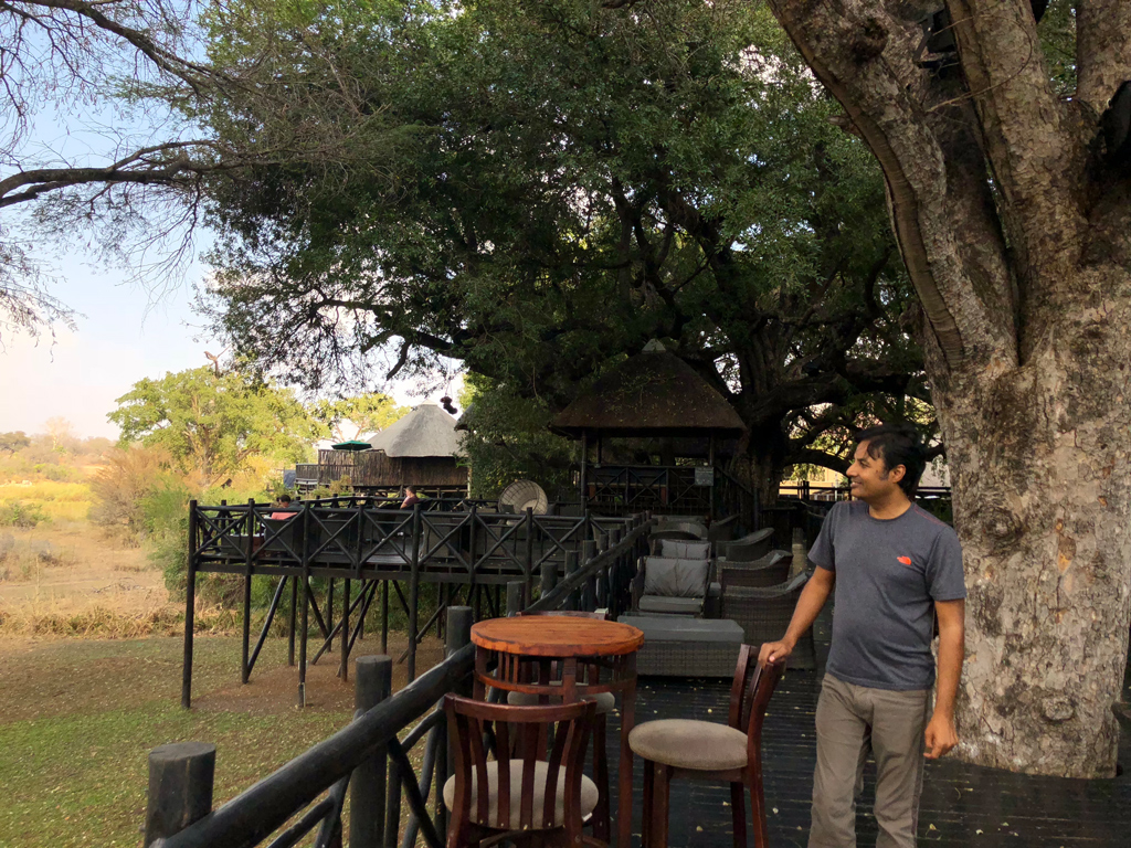 The outdoor cafe with views of the Kruger National park, the sitting huts, and the spa hut.