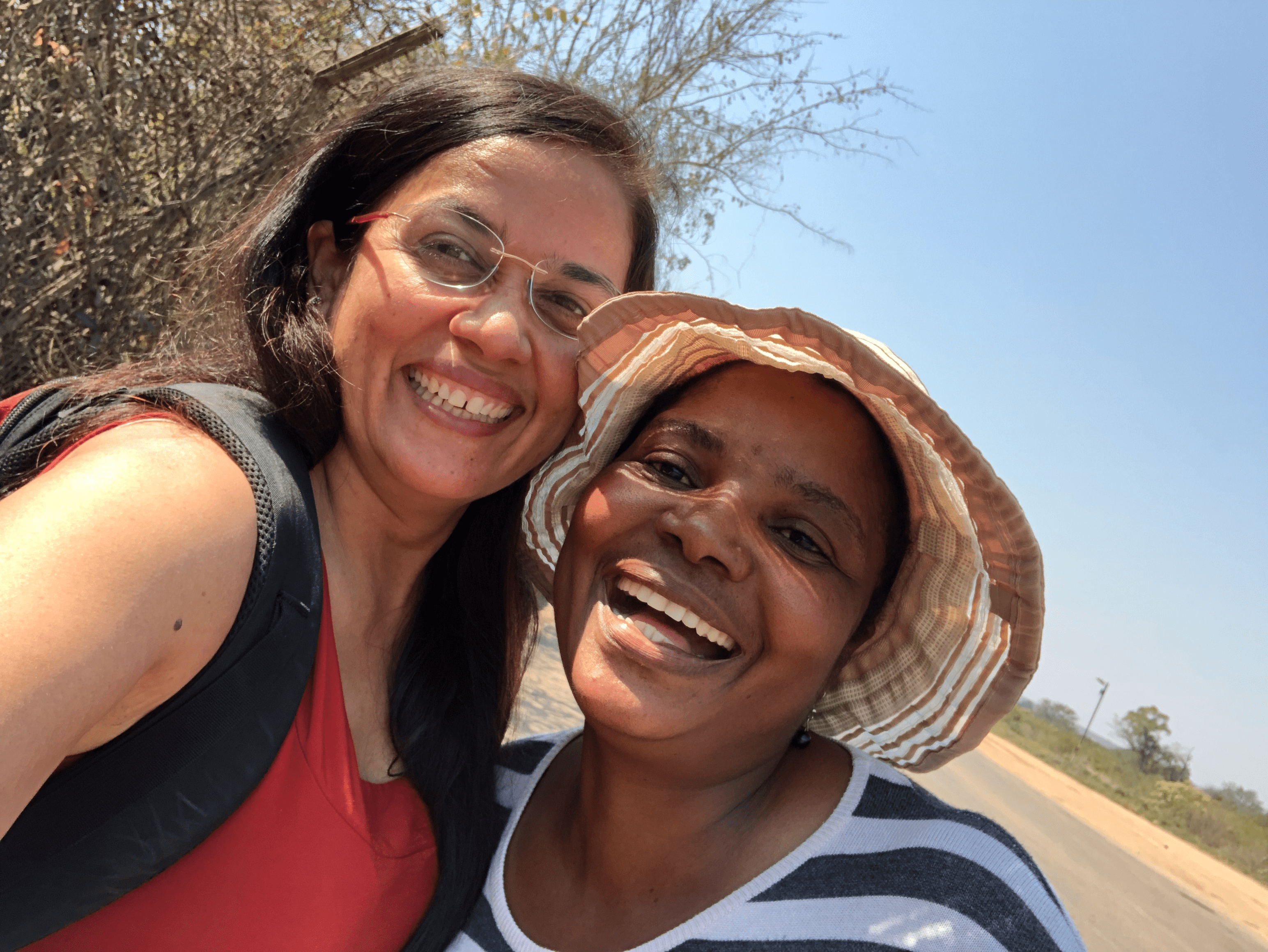 Thethelela and I crossing the bridge from Zambia to Zimbabwe by Victoria Falls