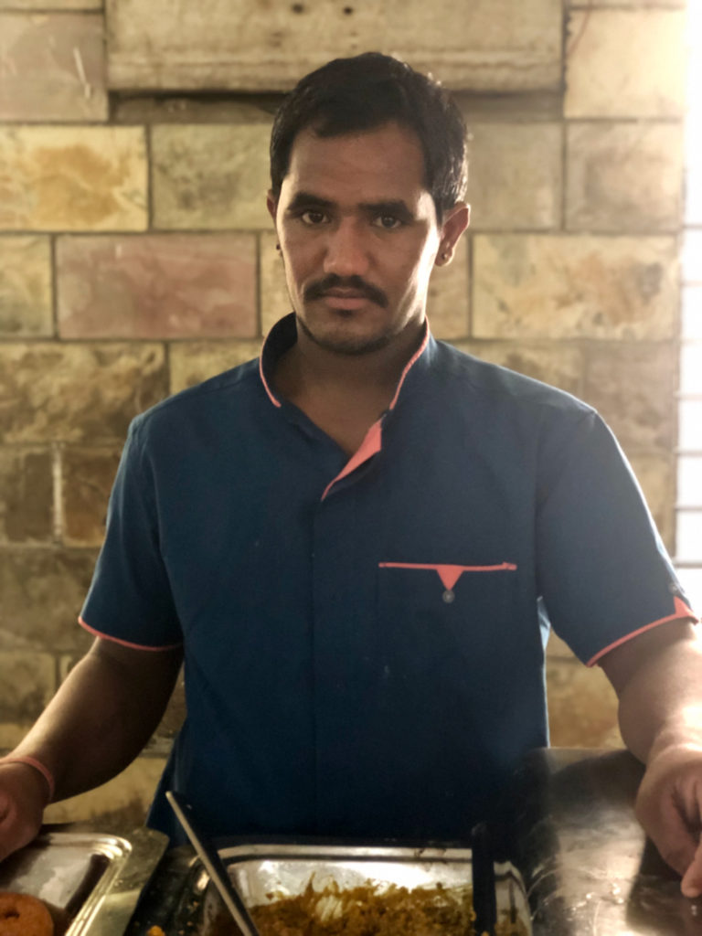 A staff member of the kitchen and bhojanshala in Kulpakji, the important Jain tirth of South India