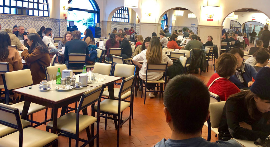 This is one of the many sitting areas in Pastëis de Belém in Belém near Lisbon, Portugal. The walls are also a museum of the store's 185 year old history.