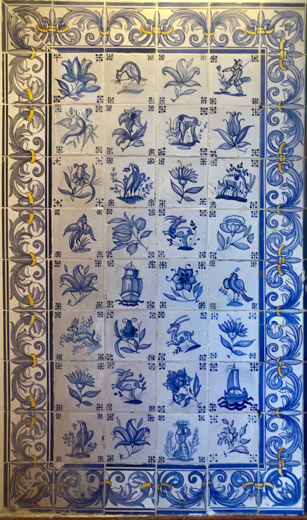 The interior of Pastéis de Belém is decorated with Portuguese blue tile art