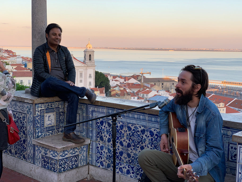 Live performances on Azulejos accompany the gorgeous sunset views over Alfama.