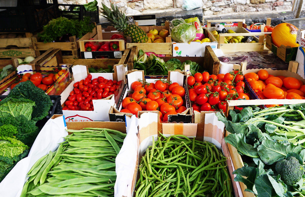 A traditional vegetable stall with fresh produce can be found nearly everywhere.