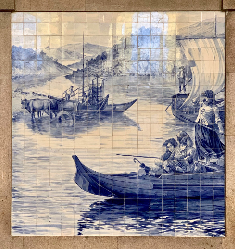 A village boat scene in São Bento train station in Porto