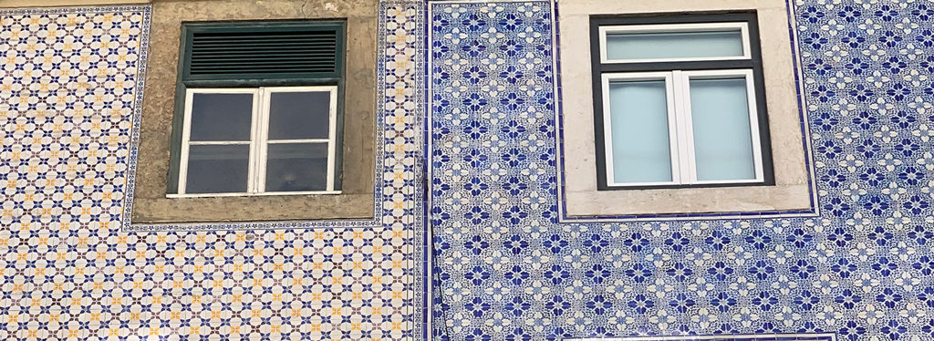 Neighbors with strikingly different tile colors and designs