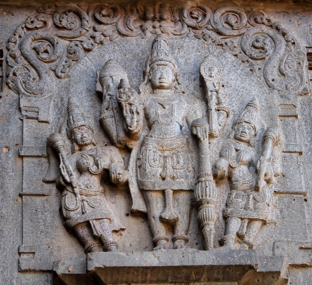  A beautiful sculpture of Lord Vishnu (identified by the Padma(lotus), Shankha (Conch), Chakra (discus) and Gada (mace), flanked by Goddess Bhudevi and Sridevi in Khidrapur Kopeshwar temple.