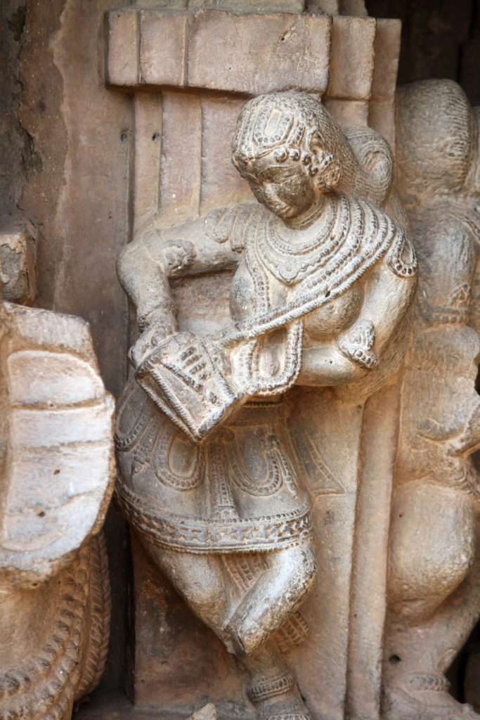 A musician and drummer welcoming visitors at the Kopeshwar Temple near kohlapur.