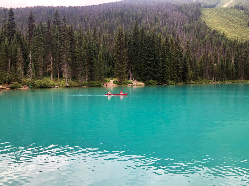 Emerald Lake in Yoho National Park, British Columbia is also a lovely place to stay or take a break from your busy Canadian Rockies itinerary for a lunch by the lake.