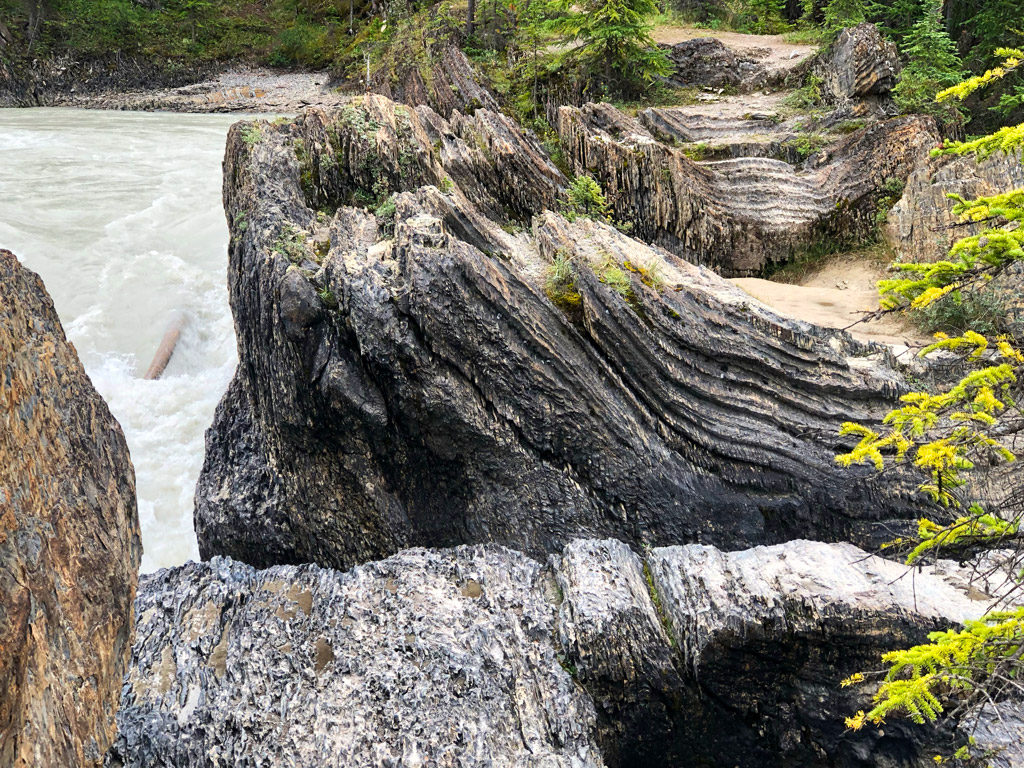 Kicking Horse River slicing through the rock to create at Natural Bridge in Yoho National Park.  