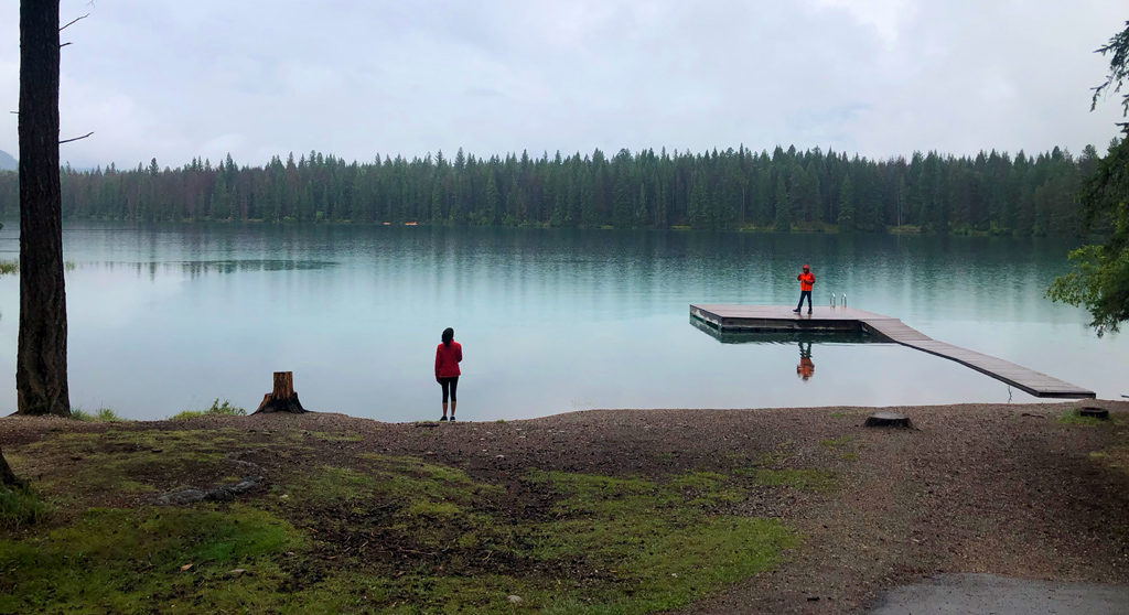 Romantic view on Annette Lake on a drizzling morning in Jasper National Park.