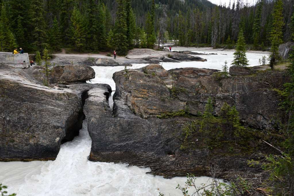 Natural Bridge on Kicking Horse River in Yoho National Park, British Columbia is quite a geological marvel. Its especially fascinating for the geology buffs touring the Canadian Rockies.