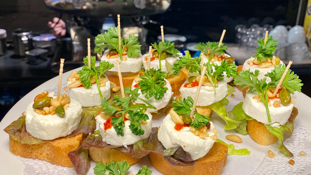 A plate of vegetarian pintxos in Golfo de Bizkaia, Barcelona.