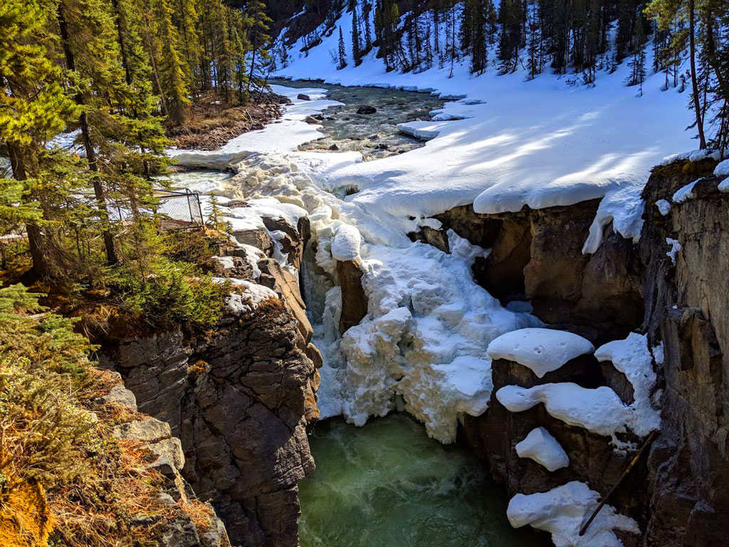 Sunwapta falls covered in ice in Alberta, Canada.