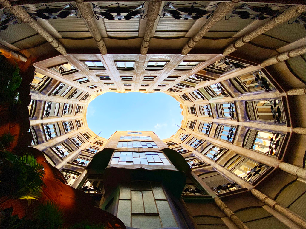 Butterfly courtyard in Case Mila, opening up to the blue sky