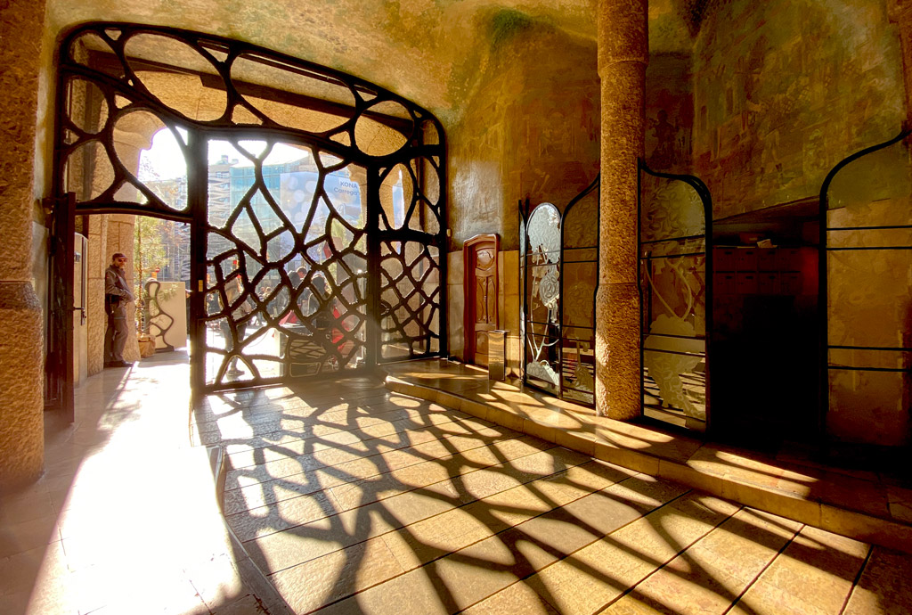 The gate at the entrance of the Butterfly Courtyard to Casa Mila is designed with patters on a butterfly wind