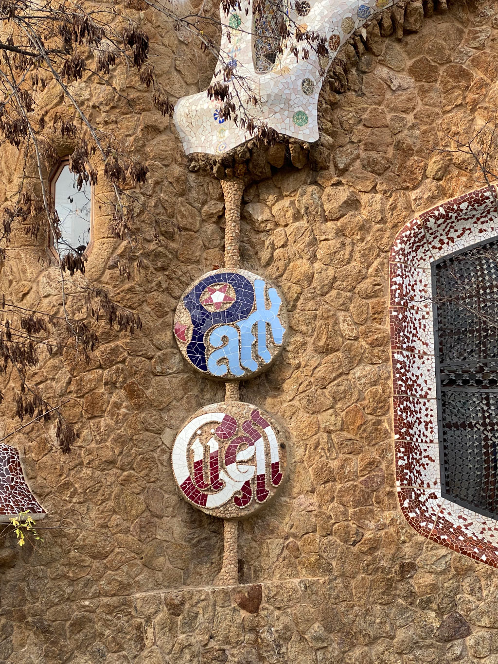 Park Güell sign is in English (Park not Parc) because this area was meant to be for luxury housing, similar to garden living in England.