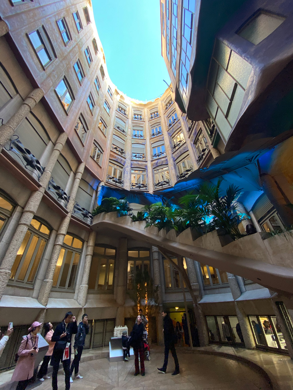 The Butterfly courtyard in Casa Mila is covered by the massive butterfly wings and opens up to the sky.  Who could tell this would have been a parking lot above the basement that goes down 4.70 meters. The building is held up by 90 columns of iron, brick and stone in the basement. It was quite and feat of engineering.