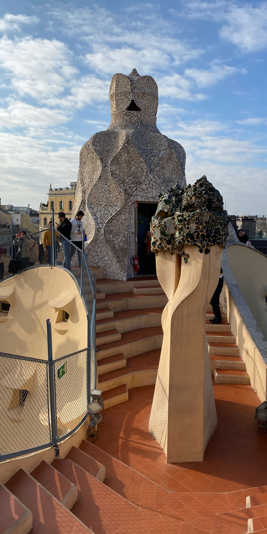 Some chimneys are individual freestanding structures, and others comprised of groups of 3 or 4. Their structure and rotation enables aerodynamic displacement of smoke from within.