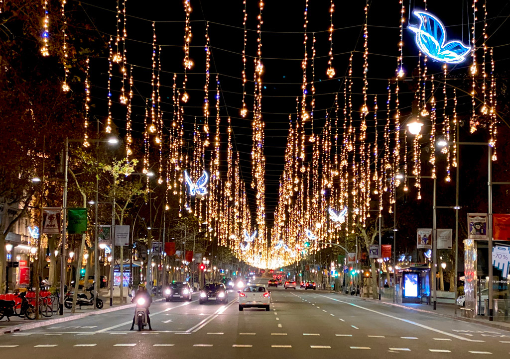 Major street in Eixample neighborhood decorated for the holidays