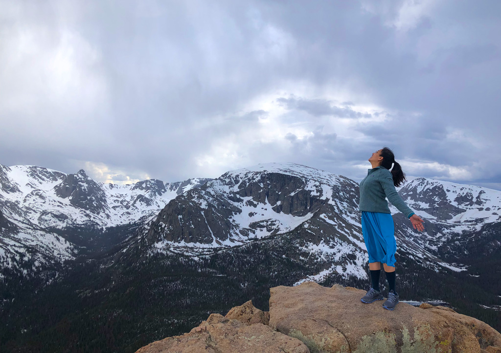 Overwhelming awe as I feel the breeze at Forest Canyon Overlook in Rocky Mountain National Park.