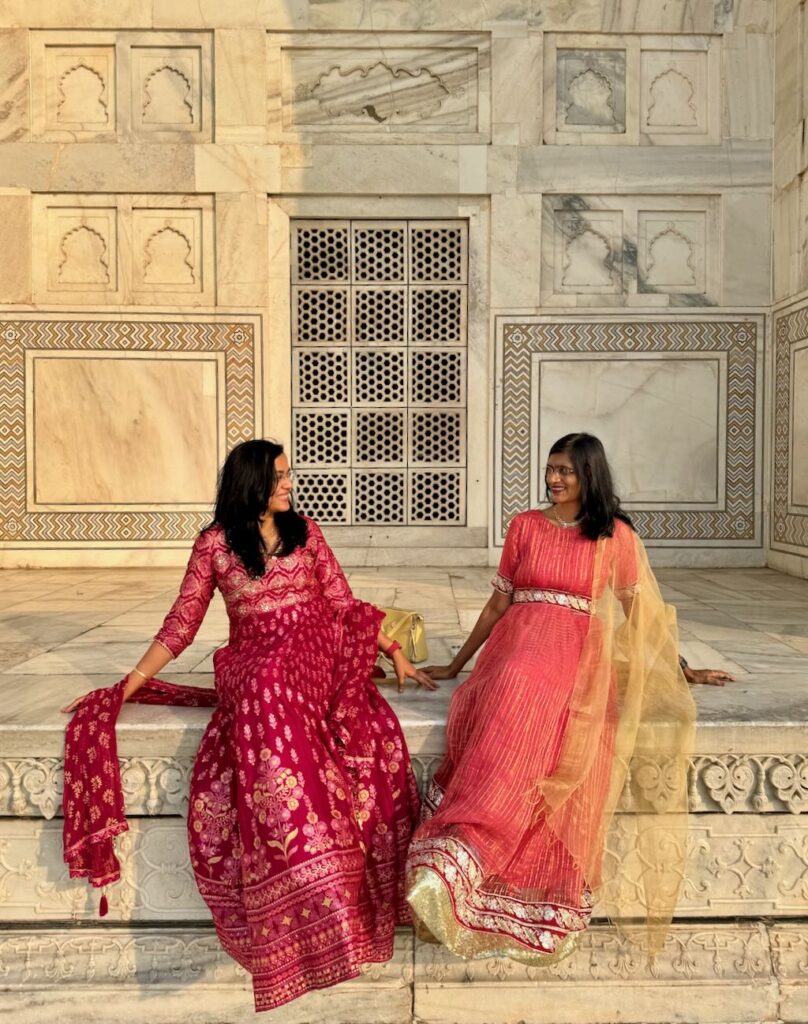 Jyoti and Seema chilling at the Taj Mahal in a corner missed by tourists