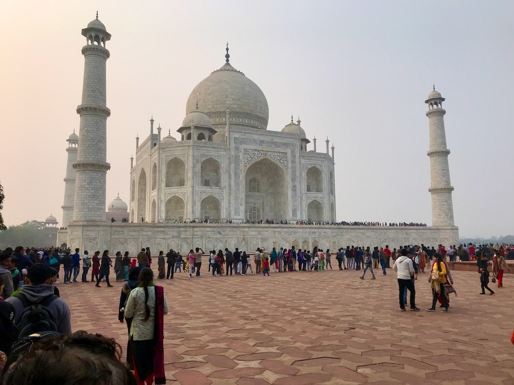 Long lines snaking around the Taj Mahal mausoleum entrance on a crowded day - mid day of Saturday Dec 30th 2017.