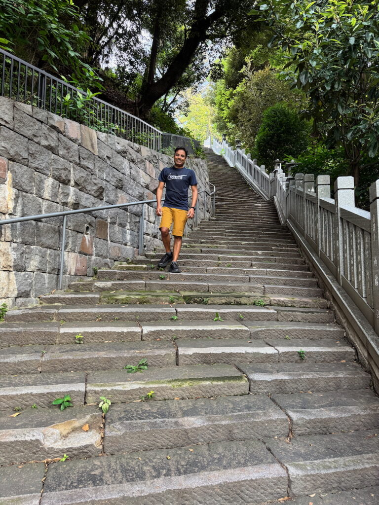 Climbing down the gentler steps at Agato Jinja