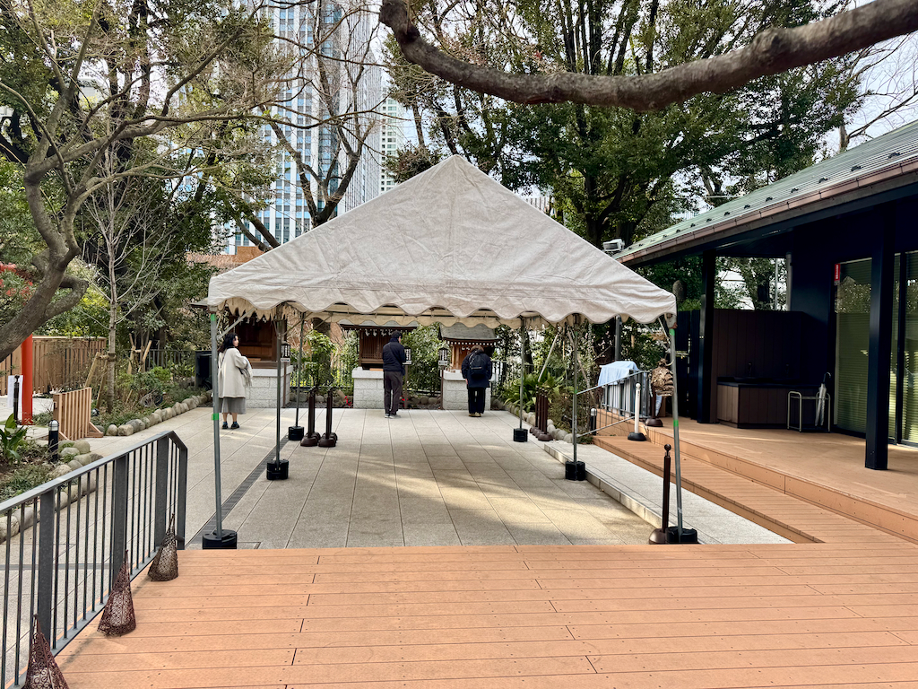 Tent setup in busy times as overflow waiting area for prayers