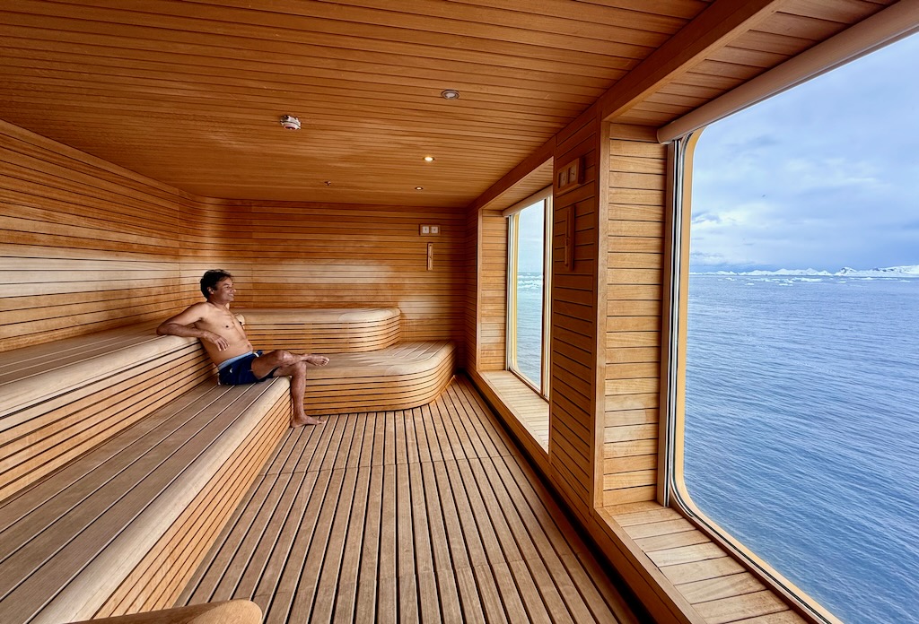 Enjoying Antarctica's icebergs from the sauna on Ultramarine